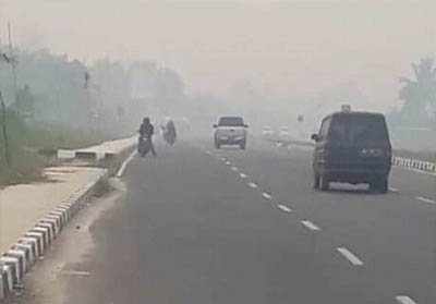 Kabut asap di Kuansing. FOTO: Riau1