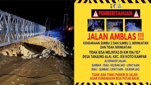 Jalan Lintas Riau-Sumbar yang longsor di Tanjung Alai diberlakukan buka-tutup.(foto: tribunpekanbaru.com)