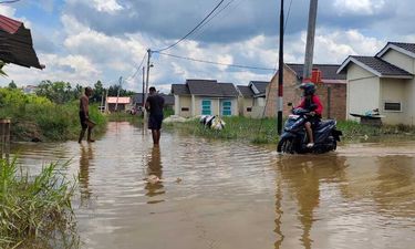 Ilustrasi banjir di perumahan di Kota Pekanbaru (foto/int)