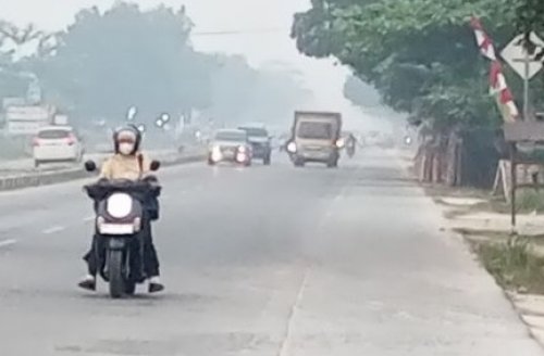 kabut asap pekat sempat menyelimuti wilayah Kabupaten Kampar beberapa hari lalu.(ilustrasi/int)