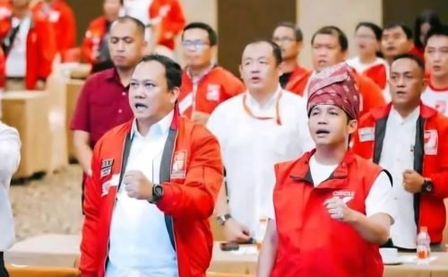 Sekretaris DPW PSI Riau, Juandy Hutauruk (kiri) saat bersama Sekjen Raja Juli Antoni (foto/int)