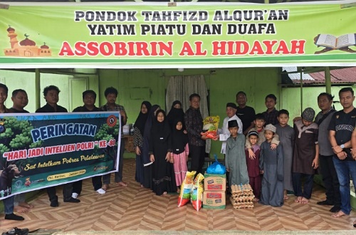 Satintelkam Polres Pelalawan salurkan bantuan dalam rangka HUT ke-80 Intelkam.(foto: andi/halloriau.com)