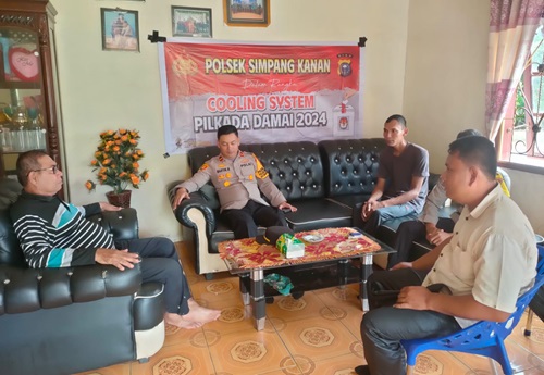 Kapolsek Simpang Kanan, Ipda Martin Luther Munte SH berikan imbauan Pilkada 2024 ke Tokoh Masyarakat Melayu (foto/afrizal)