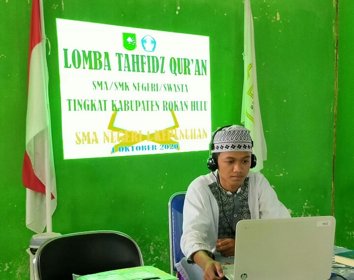 iswa Alwi Afriansyah wakili Rohul Lomba Tahfiz Quran Tingkat Riau.
