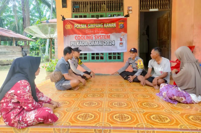 Polsek Simpang Kanan menggiatkan cooling system kepada masyarakat jelang hari pencoblosan (foto/afrizal)