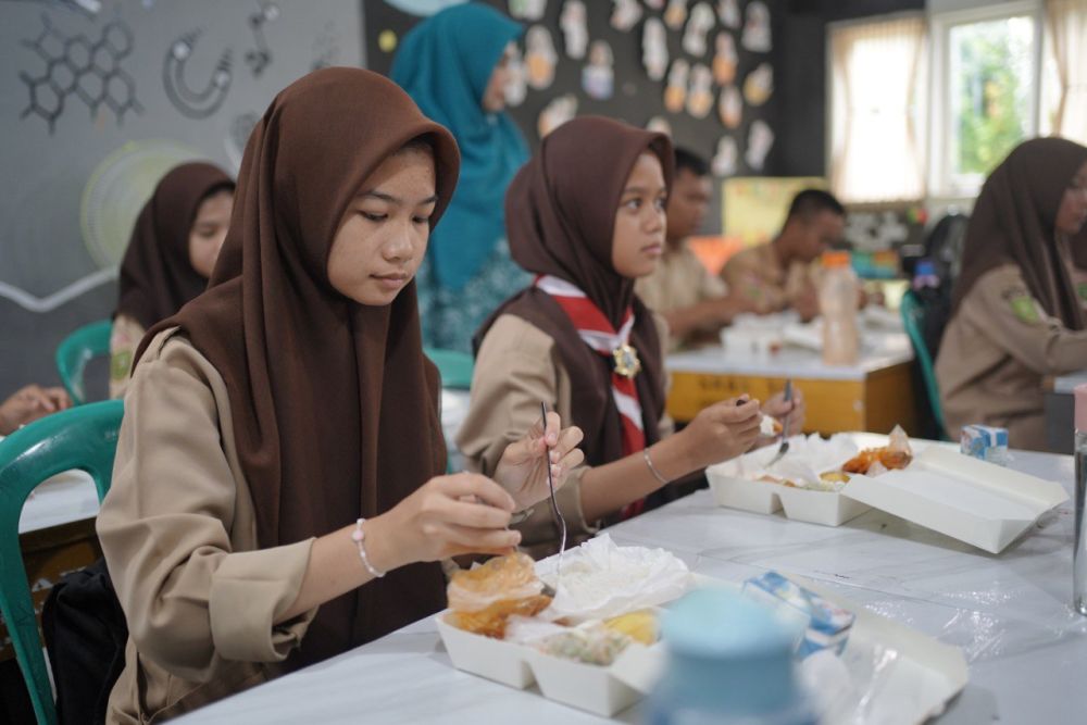 Ilustrasi program Makan Bergizi Gratis sudah dimulai pada sejumlah sekolah di Pekanbaru (foto/MCRiau) 