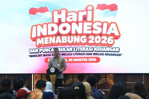 Asisten III Sekretariat Daerah Provinsi Riau, M Job Kurniawan saat menghadiri Puncak Hari Indonesia Menabung dan Puncak Bulan Literasi Keuangan (foto/ist)