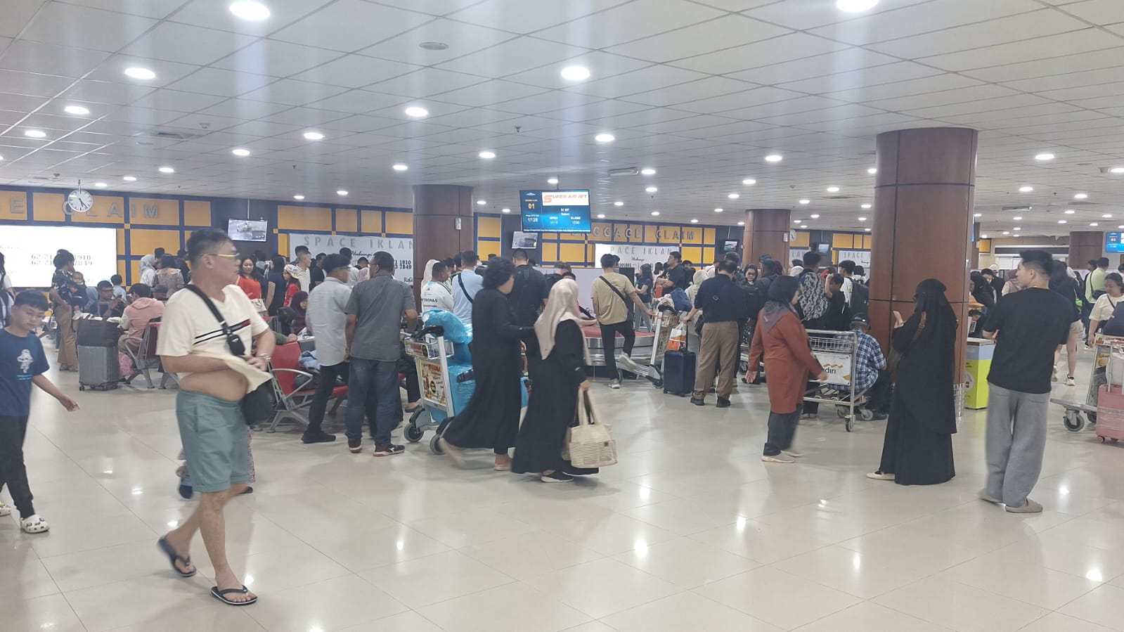 Ilustrasi puncak arus balik Lebaran 2026, Bandara SSK II Pekanbaru dipadati belasan ribu penumpang (foto/ist)