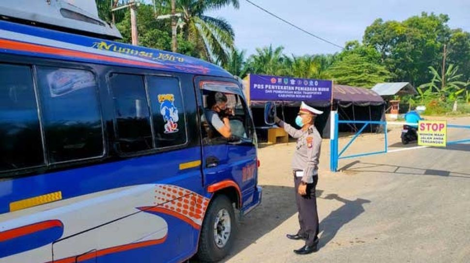 Ilustrasi pos penyekatan di batas provinsi. 