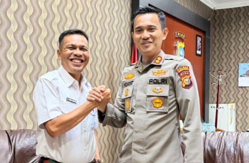 Plt Kadiskominfoss Kuansing, Hevi Heri Antoni SSos MSi dan Kapolres Kuansing, AKBP Hidayat Perdana SH SIK MH.(foto: ultra/halloriau.com)