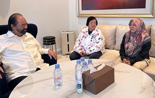 Bupati Siak terpilih, Afni Z (kanan) bertemu Ketua Umum Partai NasDem, Surya Paloh (foto/tribun)