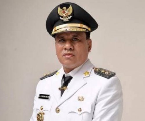 Bupati Kuantan Singingi (Kuansing), Suhardiman Amby.