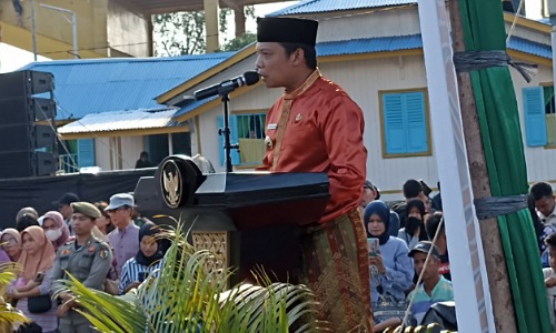 Pj Walikota Pekanbaru, Muflihun saat membuka event Petang Belimau di halaman Rumah Tuan Kadi.(foto: rahmat/halloriau.com)
