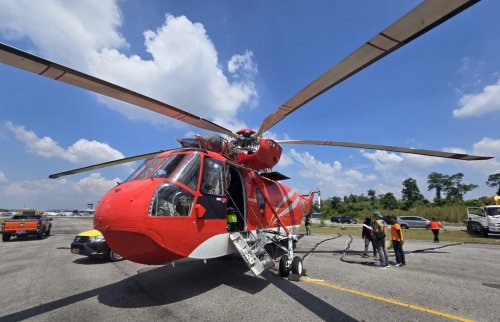 Heli Water Bombing.(foto: int)