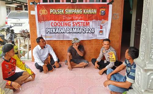 Kegiatan cooling system Polsek Simpang Kanan di Bagan Nibung.(foto: afrizal/halloriau.com)