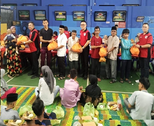 Penyerahan bantuan.