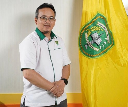 Dosen Program Studi (Prodi) Manajemen Fakultas Ekonomi dan Bisnis (FEB) Universitas Islam Riau (UIR) Gusman Nawanir, ST., M.Sc., Ph.D.