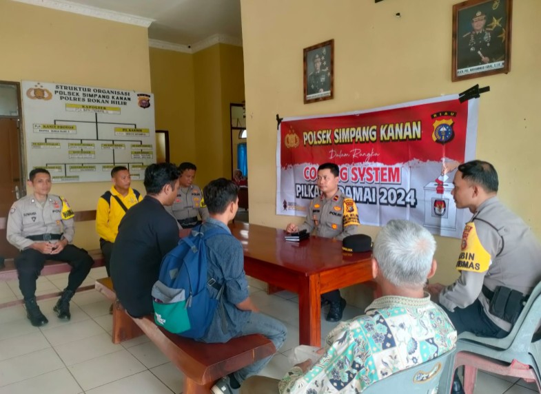 Polsek Simpang Kanan Gelar Cooling System untuk Pilkada Damai di Kepenghuluan Bagan Nibung (foto/afrizal)