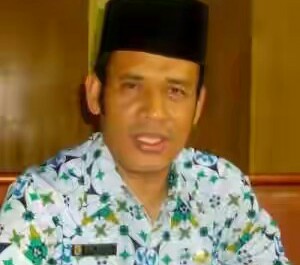  Kadis Arsip dan Pustaka Pelalawan, MD Rizal, yang juga pembina organisasi PGRI Pelalawan.