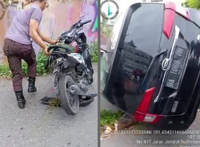 Sepeda motor yang ditabrak mobil di Jalan Sudirman Pekanbaru hancur (foto/int)