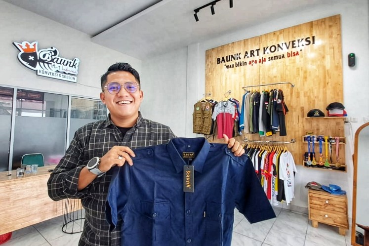 Muhammad Afdal, owner Baunk Art Konveksi di Pekanbaru (foto/riki)