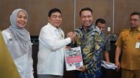 Wabup Pelalawan, Husni Thamrin bersama Anggota DPR RI Dapil Riau, Achmad.(foto: andi/halloriau.com)