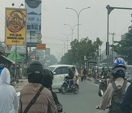 Kabut asap kian pekat selimuti Kota Pekanbaru.(foto: pajri/halloriau.com)