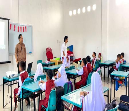 PKM Dosen UHTP Upayakan Peningkatan Digitalisasi Administrasi Rapor Berbasis Teknologi Informasi