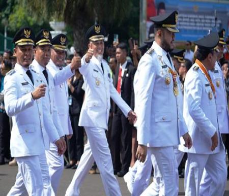 Walikota Dumai H Paisal dan Wakil Walikota Dumai Sugiyarto mengikuti Kirab dari Monas menuju Istana Negara,  Kamis (20/2/2025).(foto: bambang/halloriau.com)