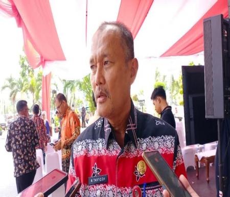 Kepala Disperindagkop UKM Riau, M Taufiq OH (foto/int)