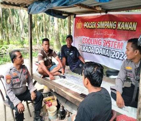 Kegiatan cooling system Polsek Simpang Kanan.(foto: afrizal/halloriau.com)