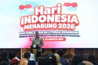 Asisten III Sekretariat Daerah Provinsi Riau, M Job Kurniawan saat menghadiri Puncak Hari Indonesia Menabung dan Puncak Bulan Literasi Keuangan (foto/ist)