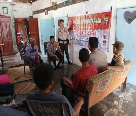 Polsek Simpang Kanan ajak bersama wujudkan Pilkada damai ke warga Bagan Nibung (foto/afrizal)