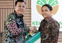 Bupati Kuansing nonaktif, Suhardiman Amby dan Menhut, Raja Juli Antoni.(foto: int) 