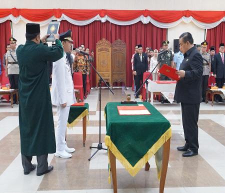 Pj Gubri, SF Hariyanto melantik Erisman Yahya sebagai Pj Bupati Inhil (foto/MC.riau)