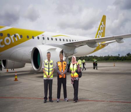 Penyambutan kedatangan pesawat Embraer E190-02 milik Scoot Airlines di Bandara SSK II Pekanbaru (foto/yuni)