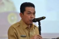 Kepala Dinas Pendidikan Provinsi Riau, Erisman Yahya (foto/int)