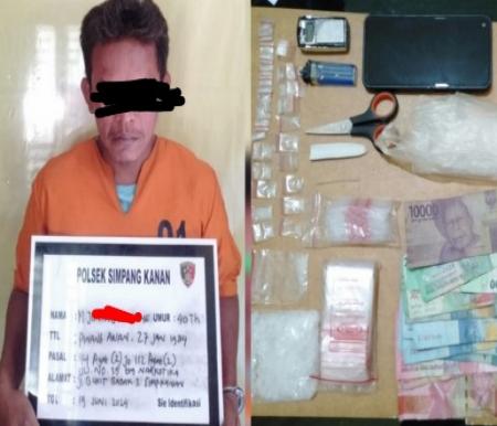 MJ alias Cedot tertangkap tangan tim Polsek Simpang Kanan miliki sejumlah paket narkoba jenis sabu (foto/Afrizal)