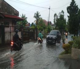 Banjir di Jalan Merak/Kassah, Pekanbaru. 